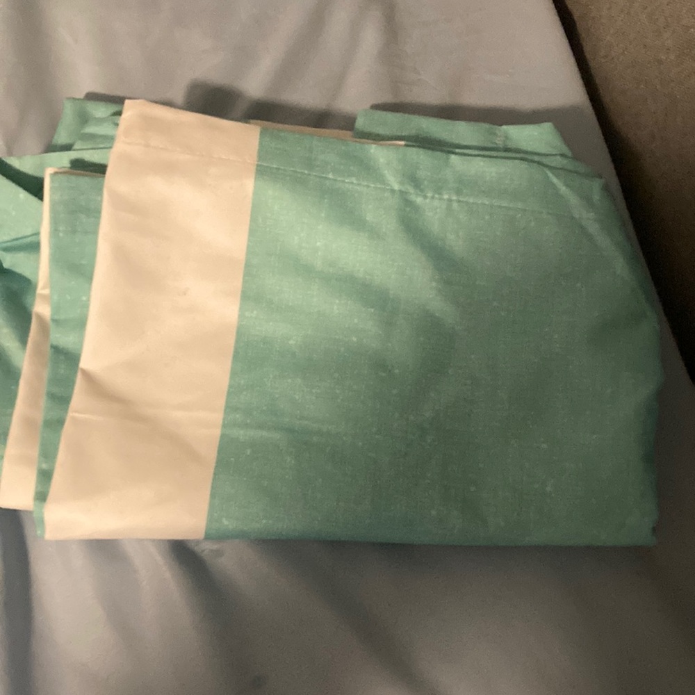 Two blue and white curtains